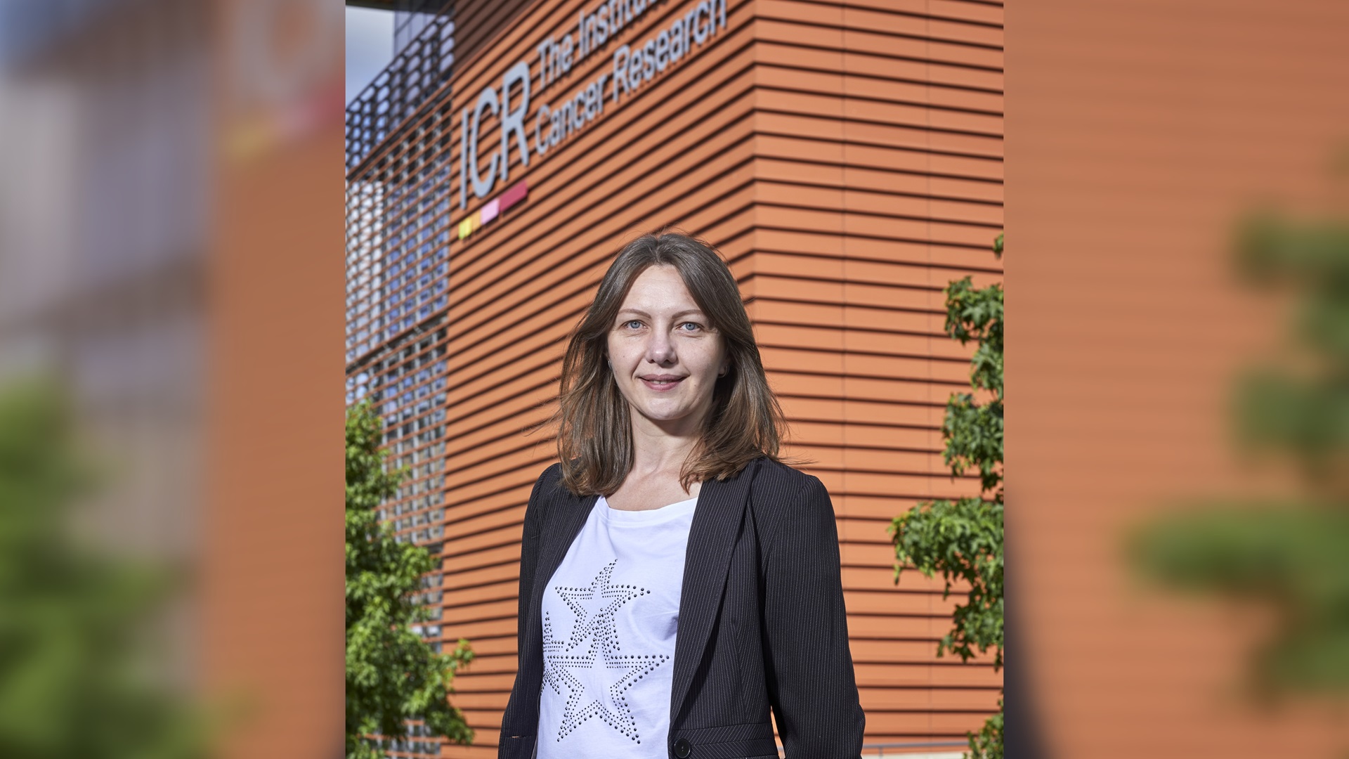 Headshot of Agnieszka Konopacka in front of an ICR building