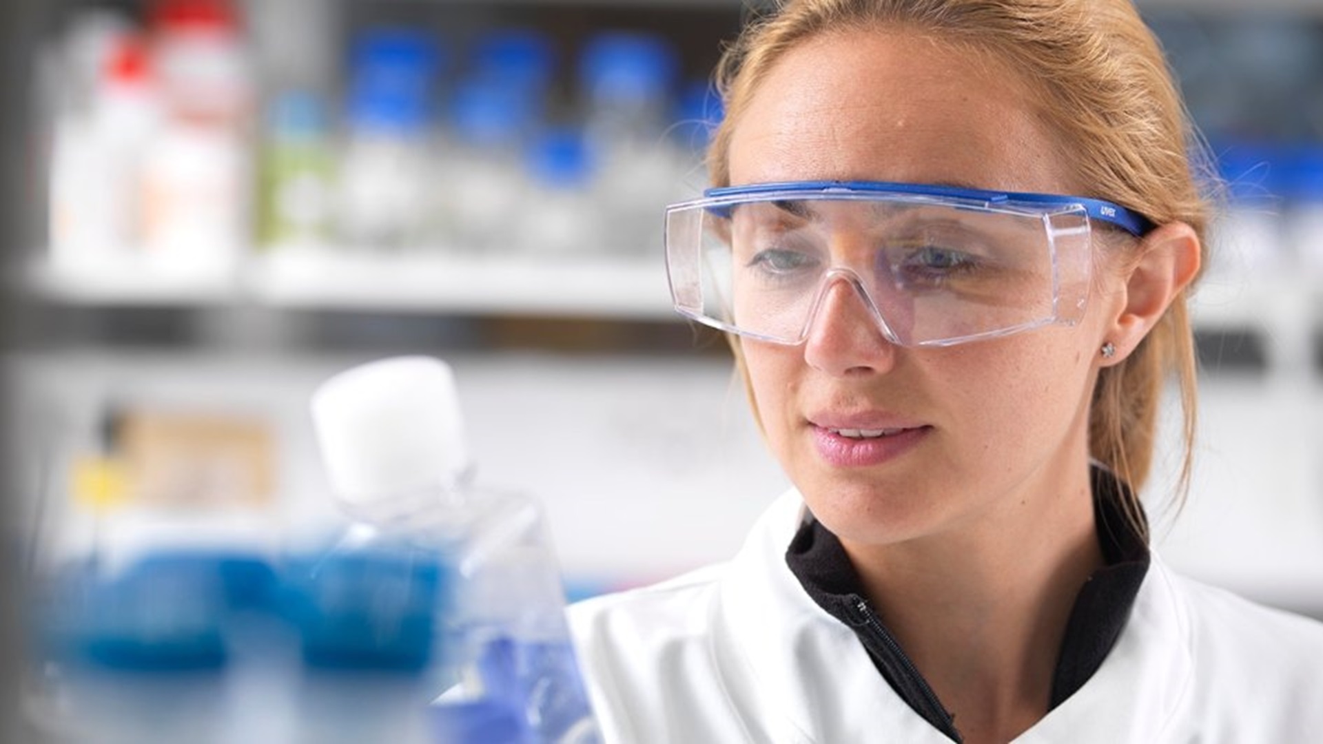 a woman working in a laboratory