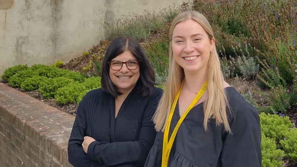 Dr Sandra Hanks, UK Laboratory Manager (left) and Laboratory Technician Naomi Costelloe (right) in front of the Innovation Gateway