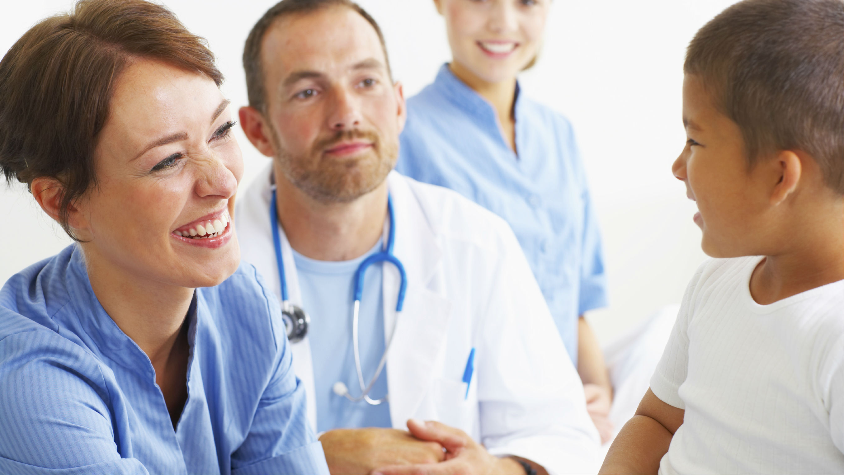 Doctors and child patient