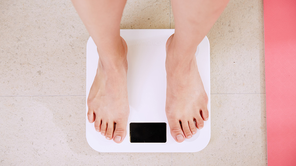 Feet on digital weighing scale