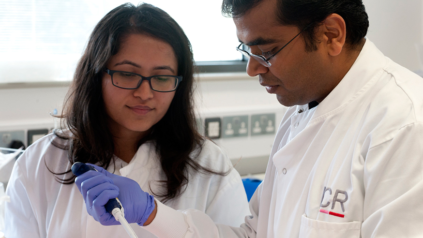 man and woman scientists embed