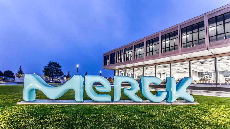 A sign reading 'Merck' outside a Merck building in Darmstadt, Germany