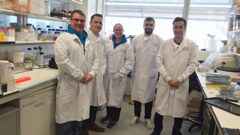 Sarah, Simon and Stuart from the Ollie Young Foundation standing with Professor Chris Jones and Dr Yura Grabovska in the ICR laboratory