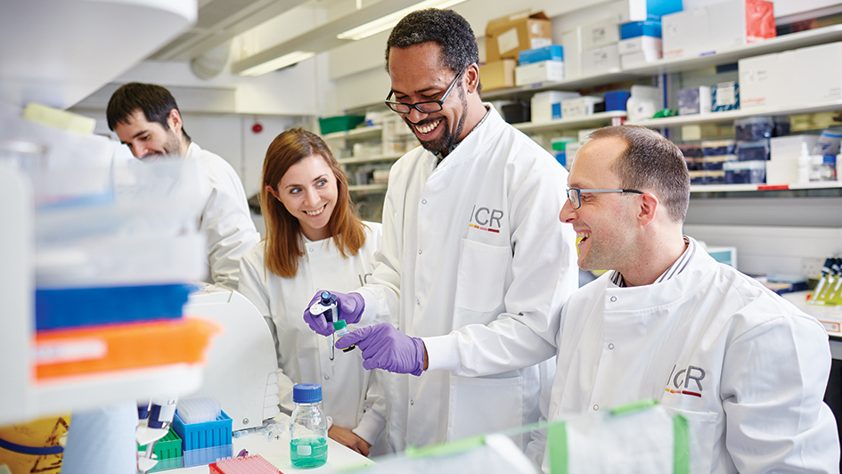 Scientists in the lab smiling