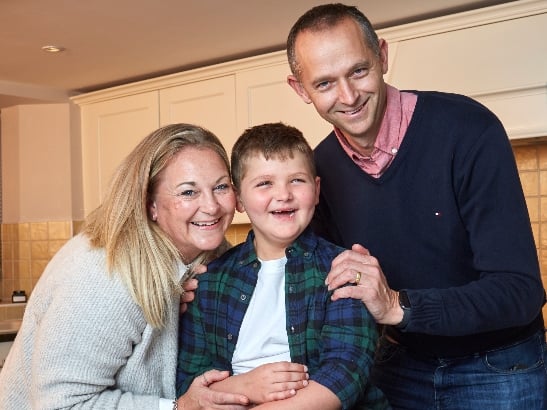 Tommy Edwards with his parents