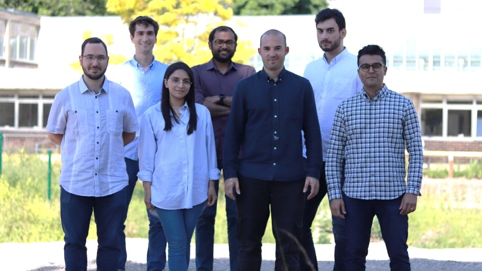 A team photo of Vesynta staff standing near the Innovation Gateway at The London Cancer Hub