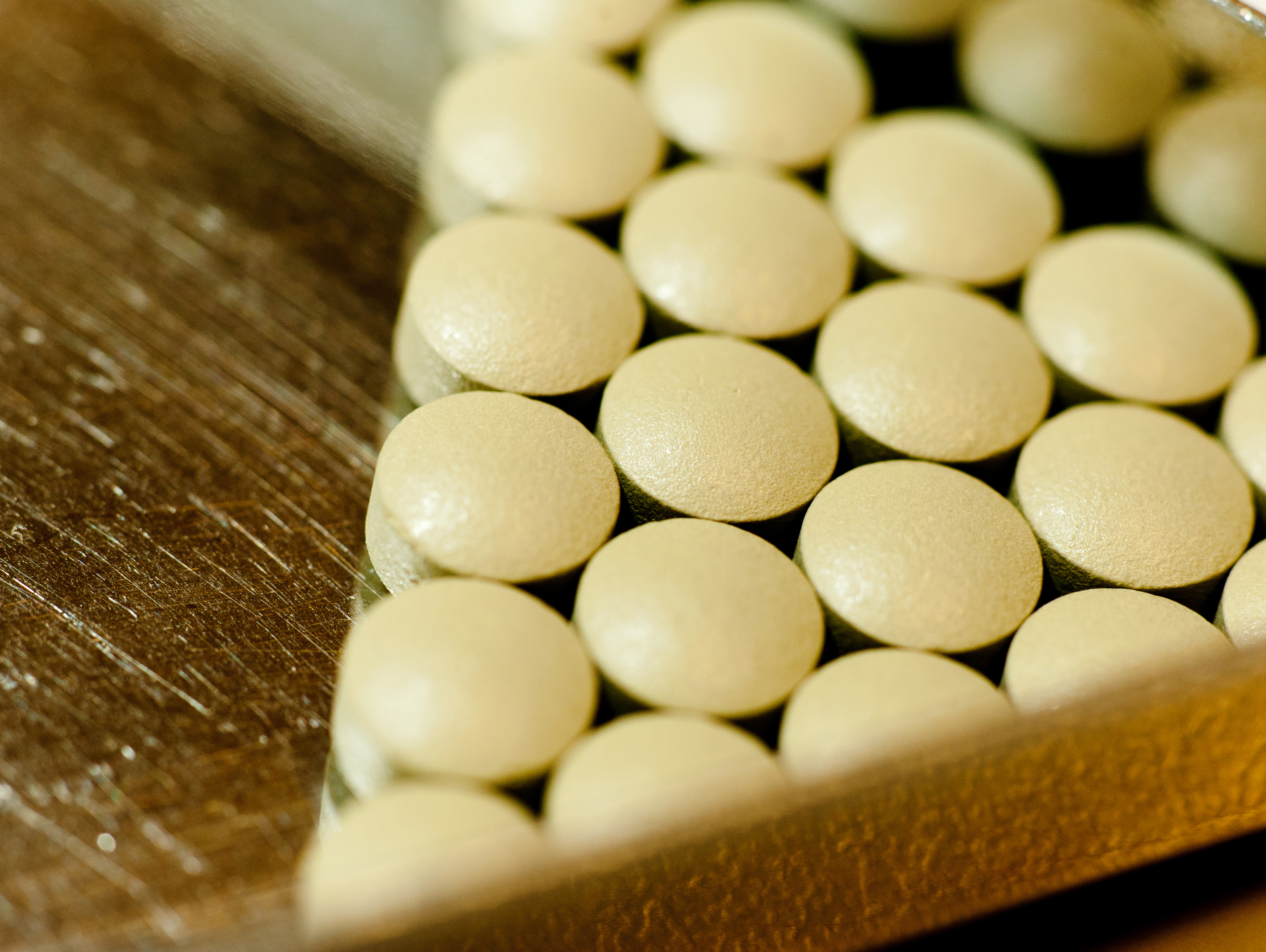 Yellow pills in dispensing tray