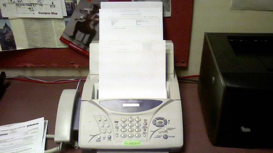 "Fax machine in my office" by Nathan Rein, Flickr.