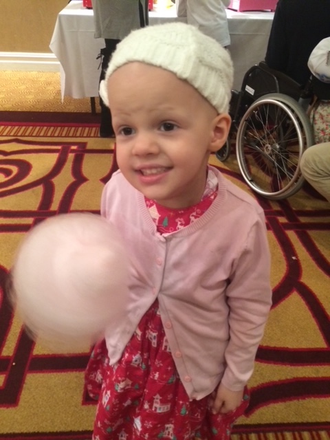 Alice smiling with candy floss